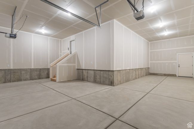 Garage featuring a garage door opener | Image 22