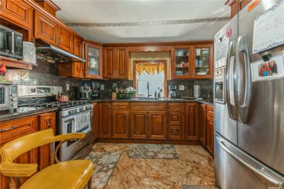 85-19 239th Street, Home with 6 bedrooms, 5 bathrooms and null parking in Bellerose NY | Image 2