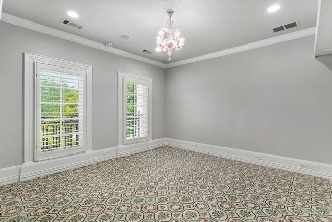 Empty room with a chandelier and crown molding | Image 36