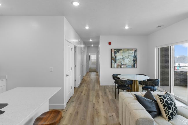 Interior space with recessed lighting, baseboards, and light wood-style floors | Image 9