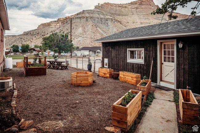 View of yard featuring a garden and a mountain view | Image 5