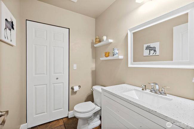 Powder room off Kitchen on main level. | Image 17