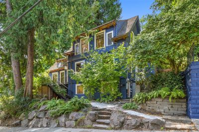 This inviting entrance sets the tone for the home’s blend of historic charm and modern updates. | Image 3