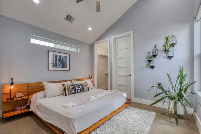 Bedroom with vaulted ceiling, recessed lighting, ceiling fan, and baseboards | Image 8