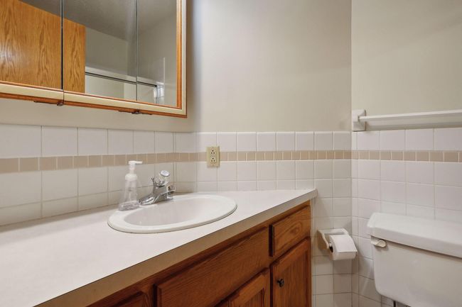 Main floor full bath- convenient for second bedroom & guests | Image 26