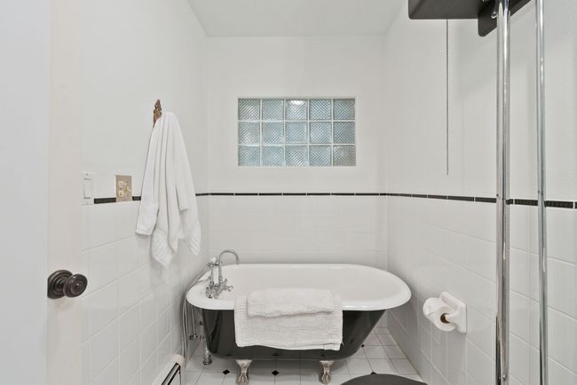 Vintage claw foot soaking tub in ground floor bathroom (also has stand up glass shower) | Image 25