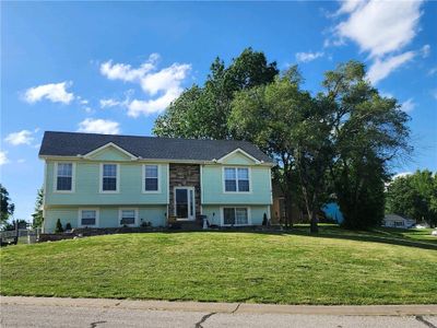 Split foyer home featuring a front lawn | Image 2