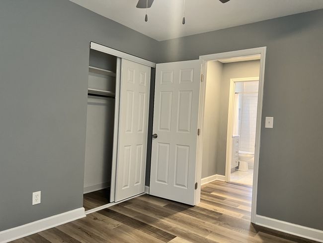 Bedroom with hall access to the new bathroom | Image 8