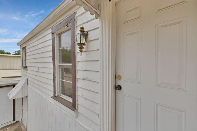 View of door to apartment | Image 31