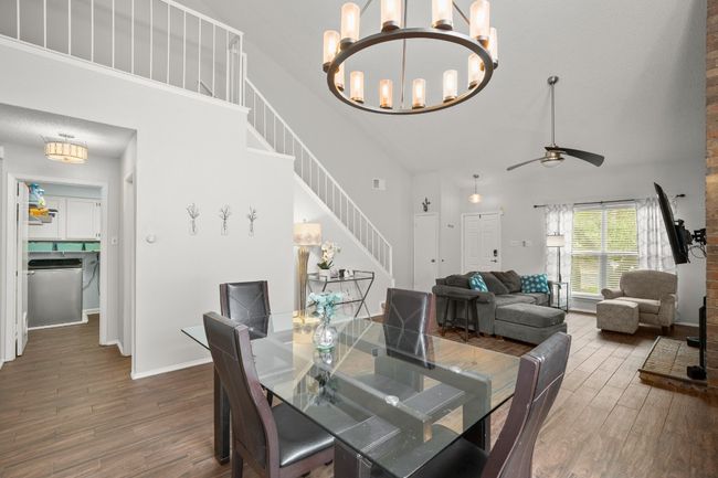 The seamless flow from the formal dining area into the kitchen makes entertaining effortless, ensuring you’re always part of the action, whether you’re serving a meal or enjoying the conversation | Image 11