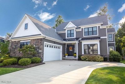 View of front of house featuring a garage | Image 1