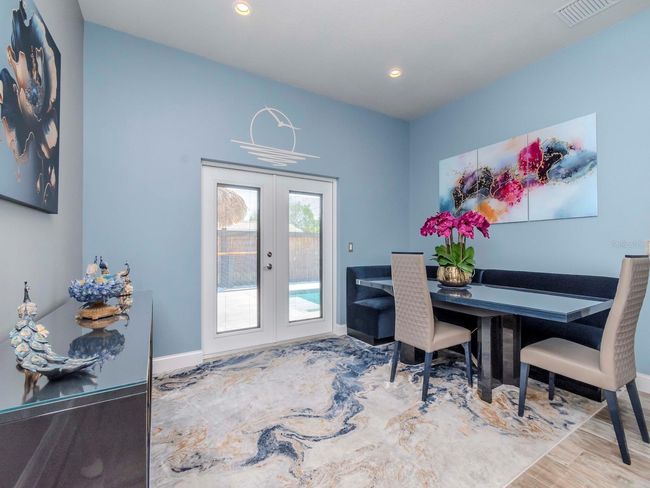 LIVING ROOM/NEW PLANTATION SHUTTERS ON ALL WINDOWS | Image 5