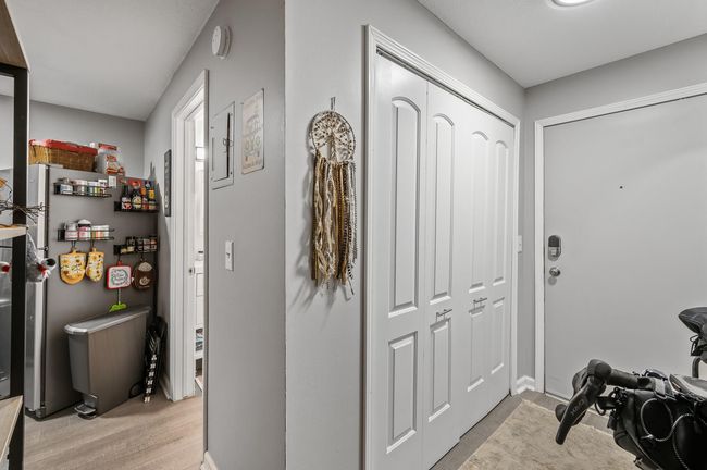 Entrance with large coat closet bring you into the kitchen..jpg | Image 12