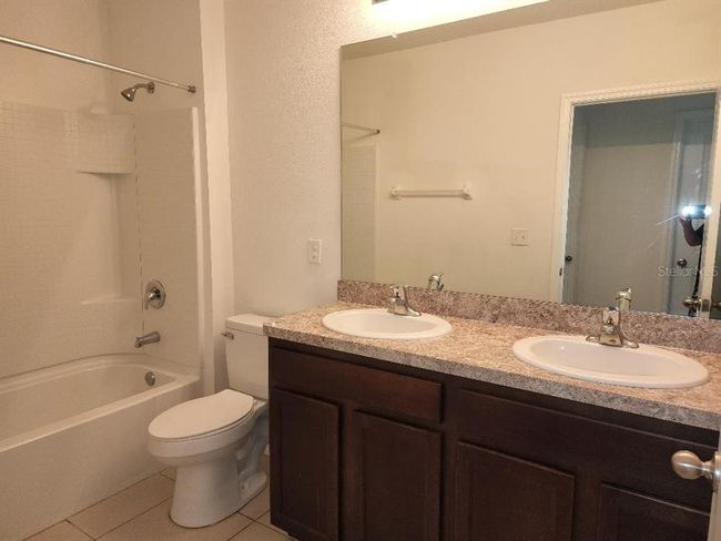 16810 Trite Bend St, House other with 4 bedrooms, 3 bathrooms and null parking in WIMAUMA FL | Image 11