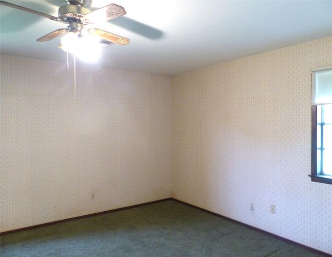 Comfortable and private primary suite with generous space. | Image 13