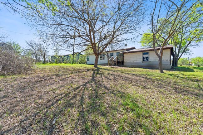 405 E Browning St, House other with 4 bedrooms, 2 bathrooms and 2 parking in Manor TX | Image 12