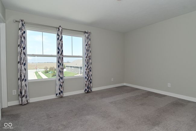 carpeted spare room featuring baseboards | Image 27