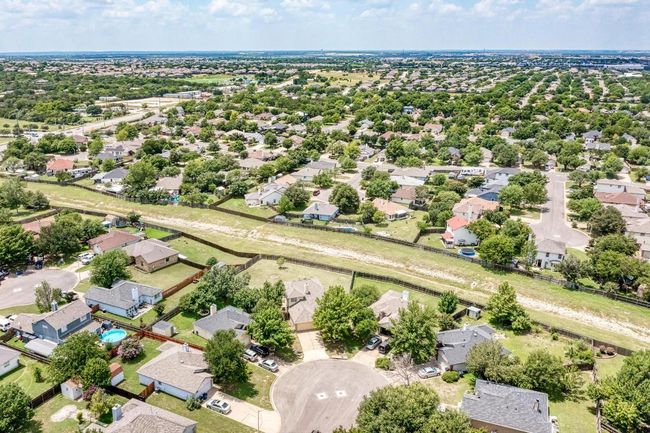 Ariel view of home and greenspace behind | Image 38