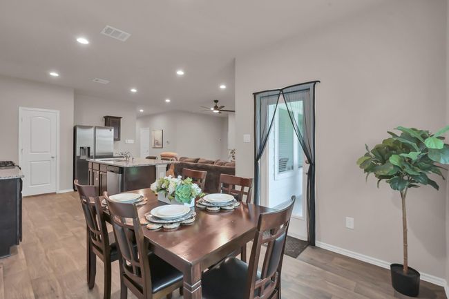 The back patio is calling your name.... we will check that out soon. But for now let's take a look at the primary bedroom! | Image 15