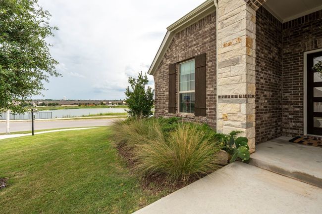 Beautiful home on corner lot with a relaxing pond view to enjoy daily. | Image 32