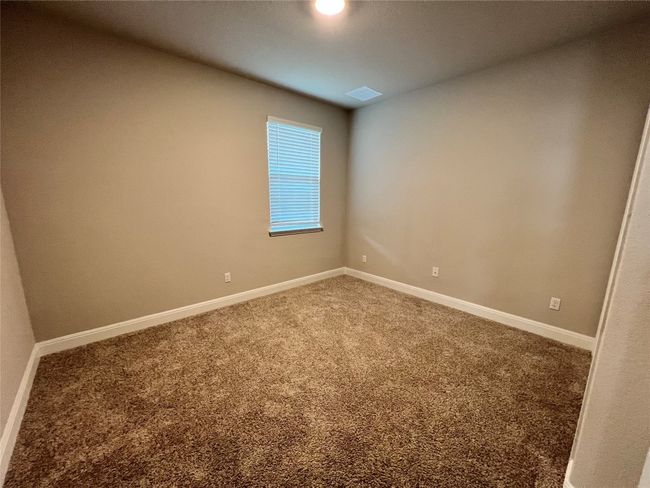 Empty room with carpet floors and baseboards | Image 11