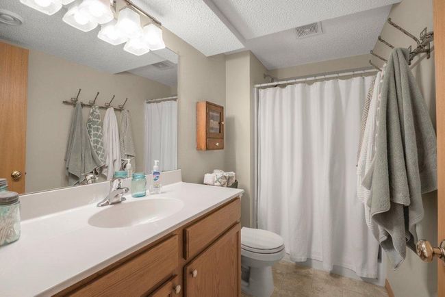 Full bathroom on the lower-level with comfort height vanity. | Image 20