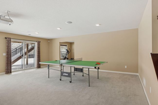 Game area has roughed-in plumbing for future Wet Bar | Image 36