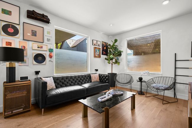 Living room with hardwood / wood-style flooring and recessed lighting | Image 9
