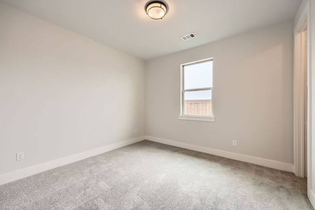Carpeted empty room with baseboards and visible vents | Image 19