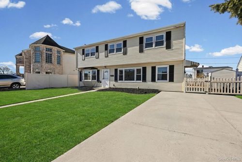 28 Candle Ln, Levittown, NY, 11756-2502 | Card Image