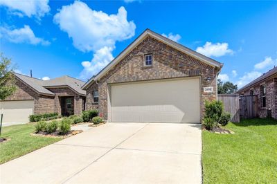 24042 Steep Climb Drive, House other with 3 bedrooms, 2 bathrooms and null parking in Hockley TX | Image 3