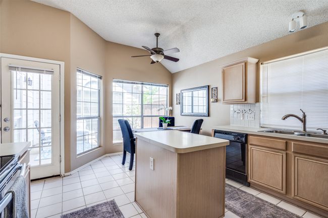 Convenient access to the patio and backyard make outdoor cooking and entertaining a breeze. | Image 12