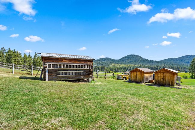 Cedar storage sheds & tractor port | Image 57