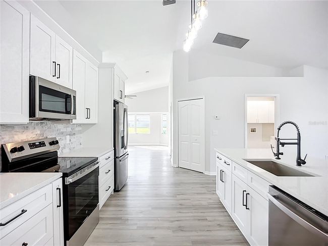 142 Broadmoor Ln, House other with 4 bedrooms, 2 bathrooms and null parking in ROTONDA WEST FL | Image 12