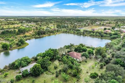 3965 56th Avenue Ne, House other with 3 bedrooms, 3 bathrooms and null parking in Naples FL | Image 3