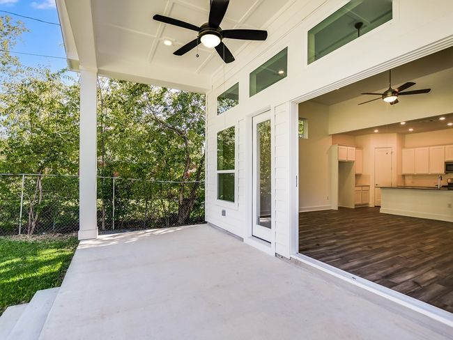 View of patio featuring a ceiling fan | Image 26