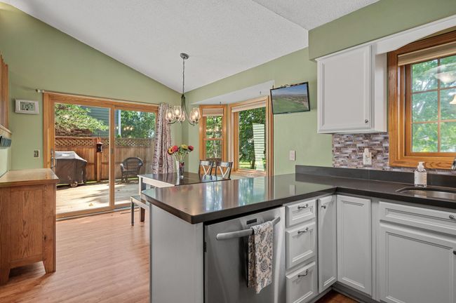 The convenient pantry enhances the kitchen's functionality. | Image 16