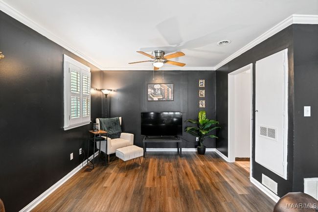 Living room view with closet storage | Image 4