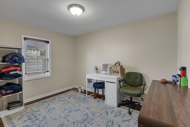 Office space featuring baseboards and wood finished floors | Image 8