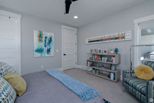 Carpeted bedroom featuring recessed lighting, ceiling fan, and baseboards | Image 20