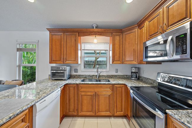 6238 Dania St, House other with 3 bedrooms, 2 bathrooms and null parking in Jupiter FL | Image 4