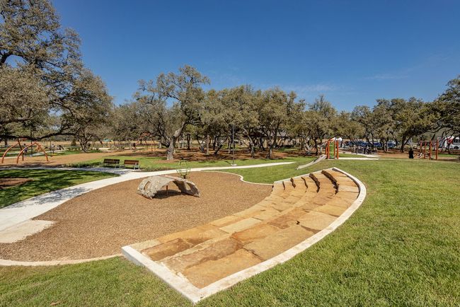 View of property's community featuring a lawn | Image 20