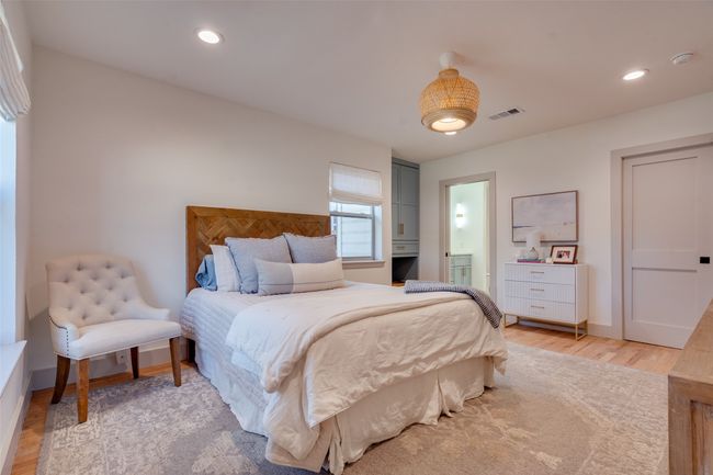 Bedroom with recessed lighting, light wood-style floors, and baseboards | Image 12