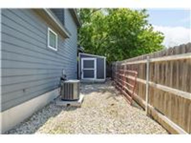 Shed behind carport, fenced backyard | Image 31