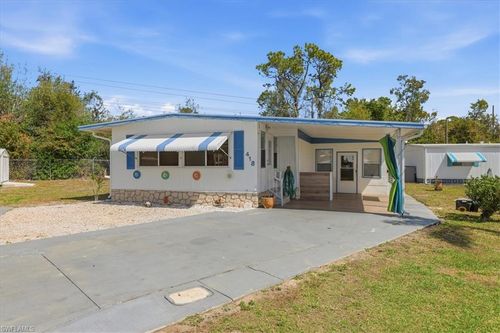 418 Timber Ln N, NORTH FORT MYERS, FL, 33917-7420 | Card Image