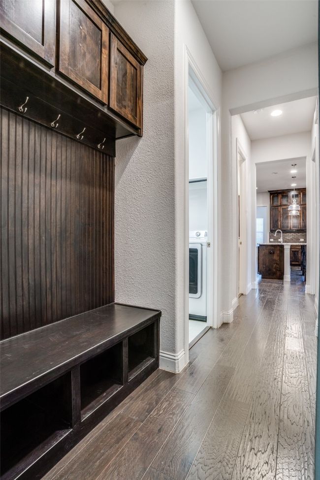 Mudroom with washer / clothes dryer, dark wood-style floors, recessed lighting, and a textured wall | Image 12