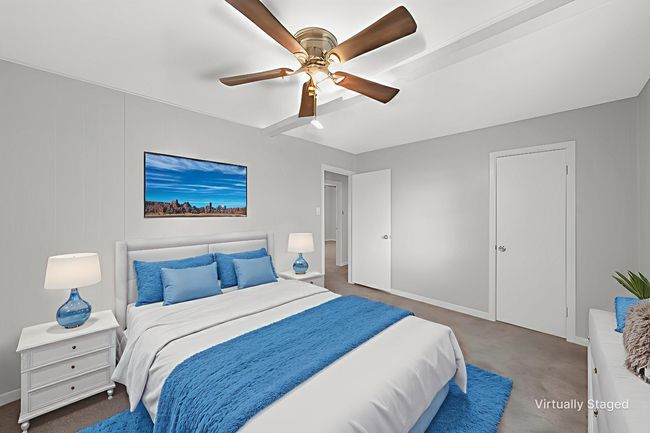 Carpeted bedroom with baseboards and ceiling fan | Image 14