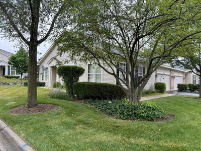 front with side drive to 2 car garage. | Image 1