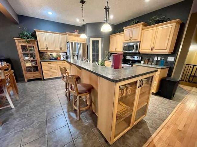 11410 89 B Street, Home with 5 bedrooms, 3 bathrooms and 6 parking in Grande Prairie AB | Image 9
