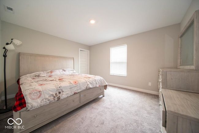 carpeted bedroom with baseboards | Image 22